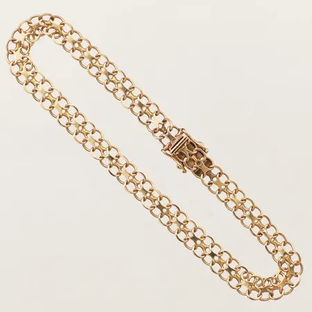 Armband X-länk längd 19cm, bredd 5,8mm 18K Vikt: 6,9 g