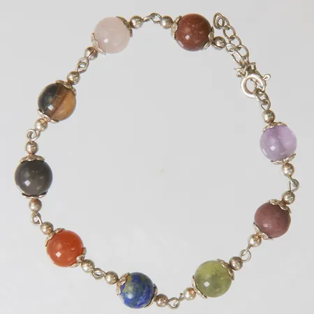 Armband med kulor av agat, jaspis, lapis, ametist, rosenkvarts, längd: ca 21,5cm, silver 925/1000 bruttovikt 10,4g.