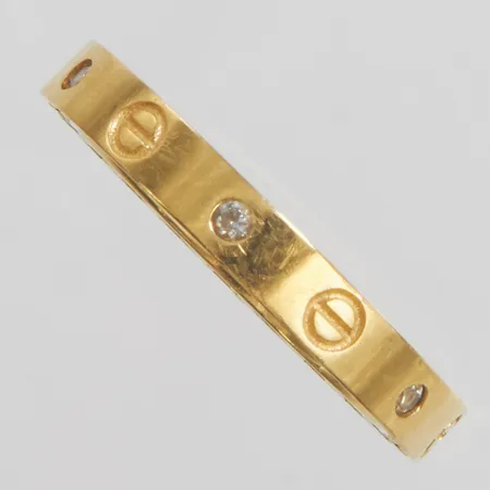 Ring med vita stenar, stl:17¾, bredd: 3mm, obs ej märkesdesign, 18K Vikt: 4,1 g