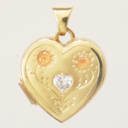 Medaljong hjärta med vit sten, längd 20mm inkl ögla bredd 15,9mm 18K Vikt: 1,6 g