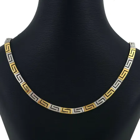Collier i 14K guld, tvåfärgad halvstel modell, collierets inre omkrets 41 cm, bredd 5,3 mm, fint skick Vikt: 20,9 g