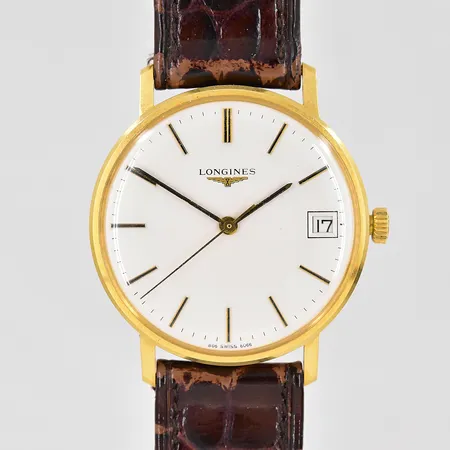 Herrur Longines 18K Ø 34mm manuell datum graverad boett läderband etui