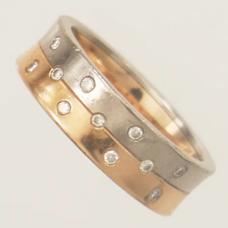 Ring med diamanter 11xca0,01ct tvåfärgat, stl:16¼ bredd 6,1mm, Schalins 18K  Vikt: 7,6 g