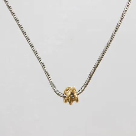 Collier formgiven av Rauff, kedjans längd: 42,3cm, hänge i 18K guld, 9x11mm, 4,1g, silver 925/1000 bruttovikt 14,8g 