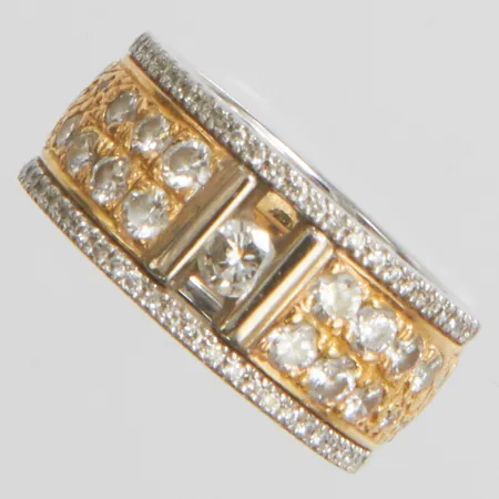 Ring med diamanter 1x 0,17ct, 54x 0,005ct, 18x 0,05-0,02ct, stl:17, bredd: 10mm, tvåfärgad, Schalins, personlig gravyr, 18K Vikt: 19,4 g