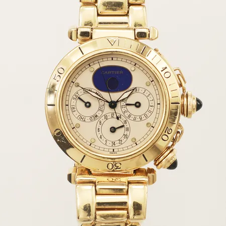 Armbandsur, Cartier Pasha 18K, quartz, Ø38mm, dag/datum, GMT, boettnr 30002, 1987, 0236, originallänk 18K, viklås, längd 18cm, repig, svaga stämplar, skadad urtavla, färgbortfall på glasring, går ej, servicebehov, bruttovikt 154,3g, inga tillbehör.