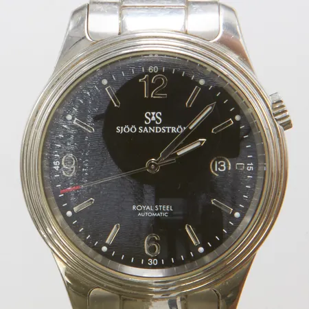 Herrur Sjö Sandström Royal Steel 2 Gent, automatisk, datum, Ø41mm, svart urtavla, Serie nr. No. 325/MMVIII, garantikort daterad augusti-2010 från Krons ur, manual, extra länkbitar, box, sliten, ytterkartong.