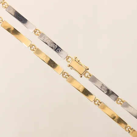 Collier tvåfärgad längd 44cm, bredd 3,8mm, gravyr 18K  Vikt: 27 g
