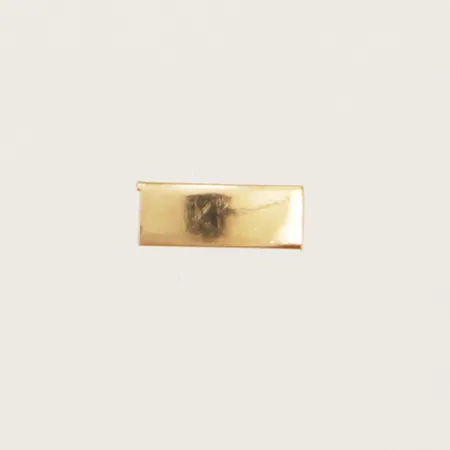 Bit guld 6,1mmx2,4mm 18K Vikt: 0,1 g