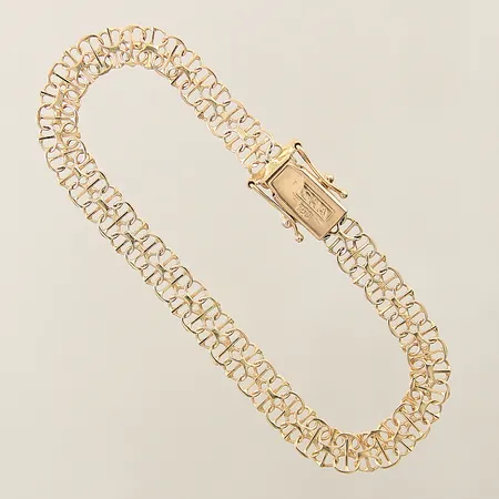 Armband X-länk med stav GHA längd 16,5cm, bredd 5,8mm, något ojämn länk 18K  Vikt: 6,2 g