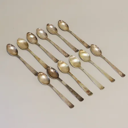 12 kaffeskedar Rosenholm GAB varav 8st med gravyr, längd 12cm, silver 830/1000 Vikt: 180,6 g