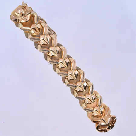 Armband längd 19 cm, bredd 14 mm 18K. Vikt: 16,4 g