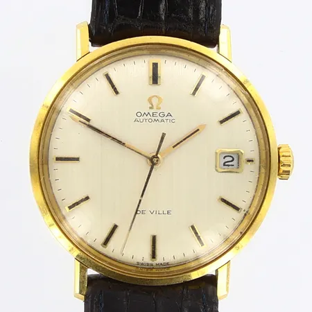Herrur Omega Deville 18K, Ø 34mm, automatisk, datum, repigt glas, bruksslitage, bruttovikt: 41,22g