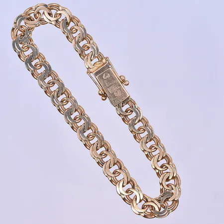 Armband Bismarck längd 18 cm, bredd 7 mm 18K. Vikt: 19,6 g