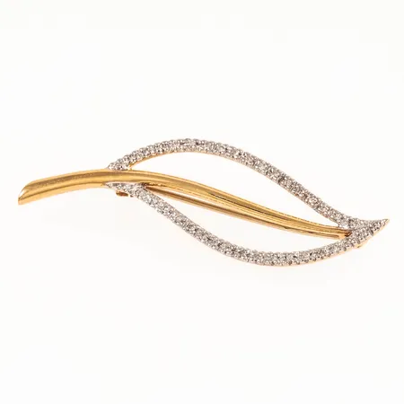 Brosch löv med 37 x ca 0,005ct 8/8-slipade diamanter 43,5x13mm, 18K 2,8g.  