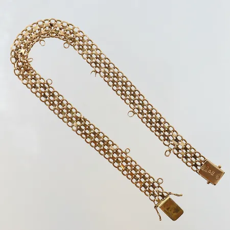 Armband X-länk med berlocköglor längd 22,5cm bredd 8,5-11,5mm slitage trögt lås 18K. Vikt: 12,9 g