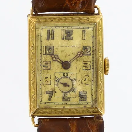 Herrur Numa watch 21x27mm, 14K i boett, gravyr, repigt glas, slitage på läderband, bruttovikt: 18,03gram