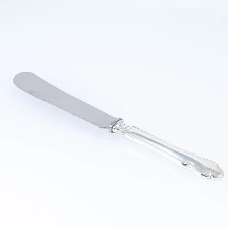 Disa i silver (830/1000) en smörkniv med rostfritt blad. Längd 165 mm. Bruksskick. Bruttovikt 36g 