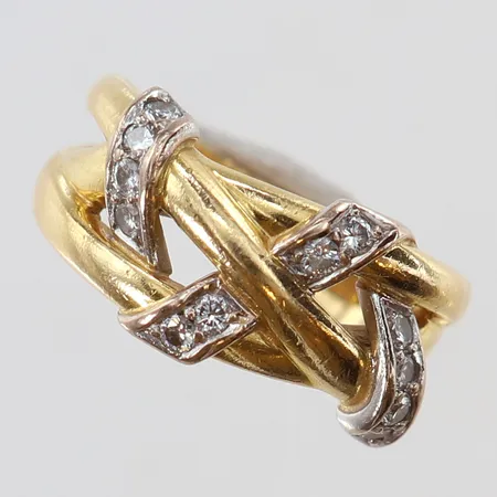 Ring med diamanter 12 x 0,02ct stl:16¼ bredd 3-8,5mm Engelbert 1994 18K. Vikt: 6,8 g