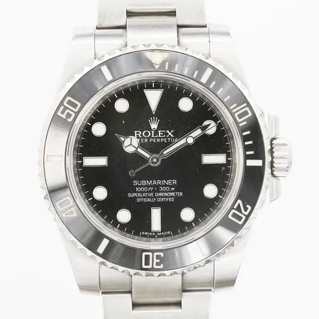 Herrur Rolex Submariner "No-Date" automatisk, stål, oysterlänk, refnr: 114060, snr: 9D76S599, boettnr: 2360, cal. 3130, verknr: 33805244, certifikat daterat 2012, instruktions-, garanti- och servicebok, kvitto från Mayors, Fort Lauderdale, Florida år 2012, fyra extra länkbitar, putsduk, box samt ytterkartong