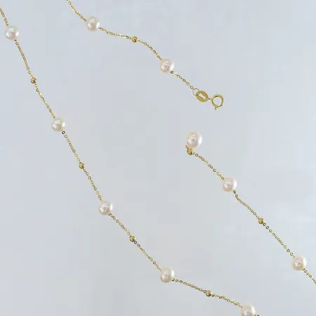 Collier med odlade sötvattenpärlor längd 45cm Ø6mm saknar låsögla 18K.  Vikt: 4,7 g