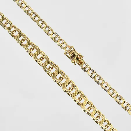 Collier Bismarck doserad längd 46 cm, bredd 5-8 mm, 18K. Vikt: 19,5 g