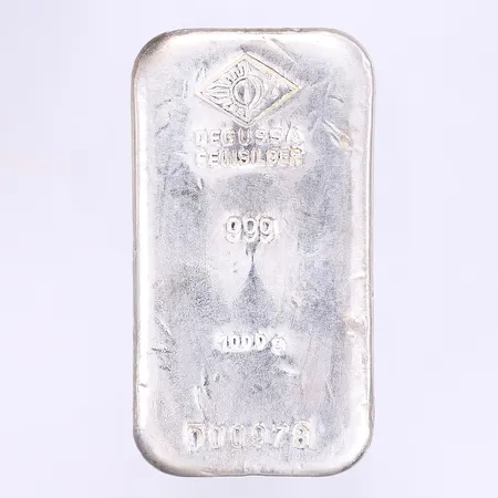Silvertacka Degussa Feinsilber serienummer 000978, bruksslitage, silver 999/1000 Vikt: 999,6 g