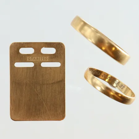 Guldsmycken gravyrer 18K. Vikt: 8,7 g