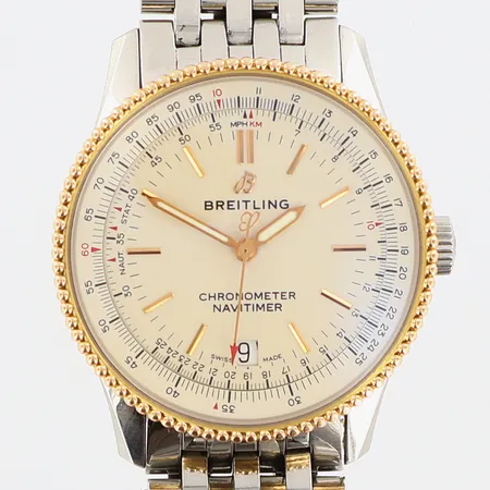 Armbandsur Breitling Navitimer Automat 38, stål med roséguld i bezel, automatisk, refnr U17325211H1S1, serienummer 700259, 3 böcker,  extra länkbitar, box, warrantycard, box och ytterkartong, bruksrepor på länk och lås.