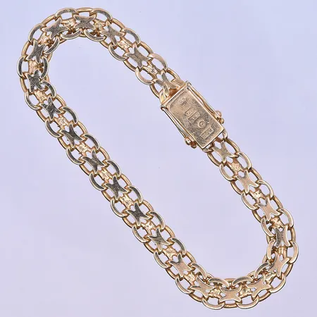 Armband X-länk längd 21 cm, bredd 8 mm 18K. Vikt: 22,7 g
