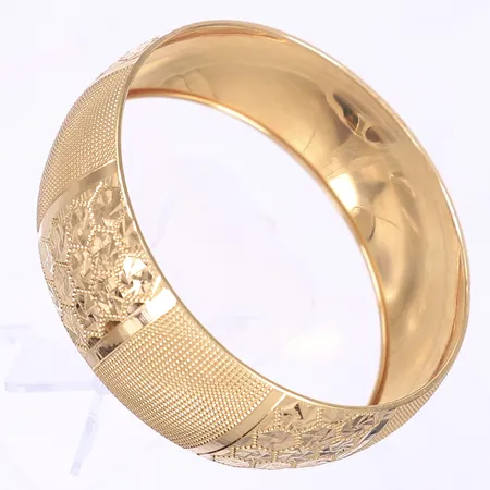 Armring mönstrad dekor Ø62mm bredd 22mm något ojämn 18K Vikt: 14,9 g