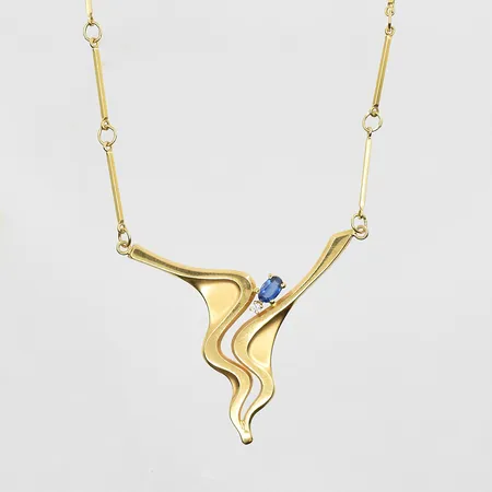 Collier med blå sten längd 42 cm, länkens bredd 1-2 mm, 18K. Vikt: 6,7 g
