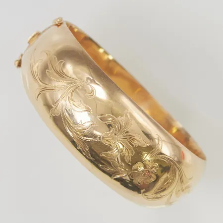 Armring öppningsbar 60x56mm, bredd 14x24mm dekorerad, 18K 38,2g.