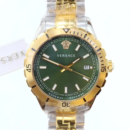 Herrur Versace gulmetall/stål, quartz ref-nr VE3A serie-nr:230003692146 grön urtavla box inplastad nyskick.