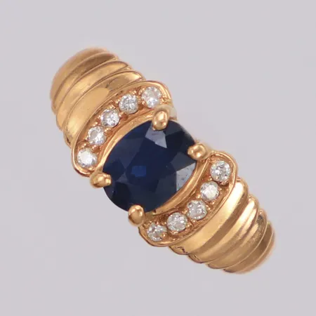 Ring med safir och diamanter 10 x ca0,01ct, stl15, bredd 7,4mm, 18K Vikt: 2 g