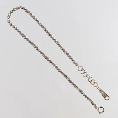 Armband med kulor längd 17-20cm bredd 3mm vitguld 18K. Vikt: 3,5 g