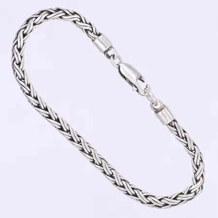Armband flätad modell 18cm bredd 4mm något skevt lås 925/1000 silver Vikt: 14,2 g