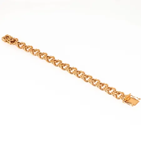 Armband Bismarck i 18K guld. Längd 20,5 cm. Bredd 11,3 mm. Kistlås. Tillverkat 1966 av Vibergs Guldvaror i Avesta. Fint skick. Vikt 42,4g Vikt: 42,4 g