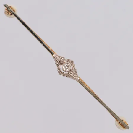 Brosch med diamant ca 0,04ct, längd 58mm, bredd 6mm, 18K Vikt: 2,8 g