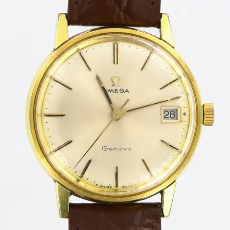 Herrur Omega Geneve Ø35mm manuell, plastglas datumfönster, guld på stål, läderband, går ej att ställa