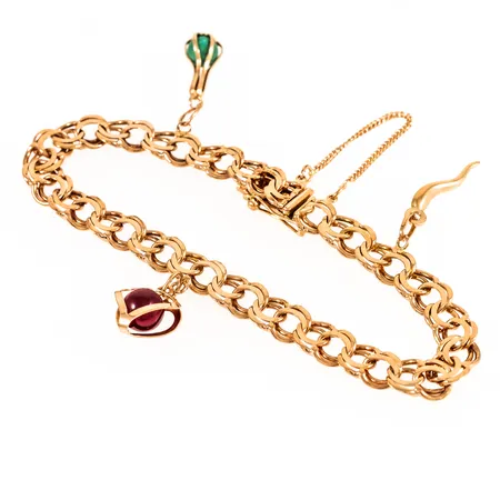 Armband Bismarck med tre berlocker längd 19cm bredd 7,5mm, 18K 15,5g.  