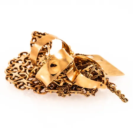 Diverse defekt/graverat guld 18K 32,9g.  