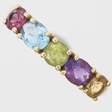 Ring med citrin, peridot, topas och troligtvis turmalin, stl: 17¼, bredd 2mm, 18K.  Vikt: 2,2 g