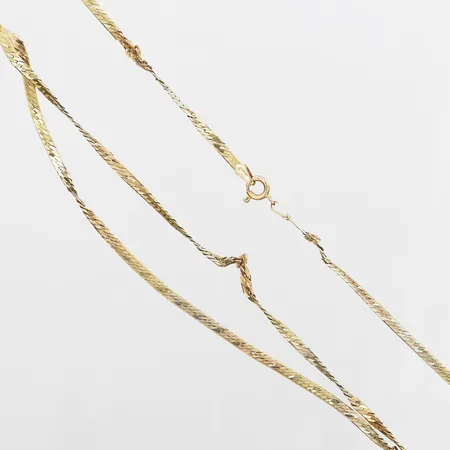 Collier längd 44cm, bredd 2,5mm, bucklor, ojämna länkar, 18K. Vikt: 8,9 g