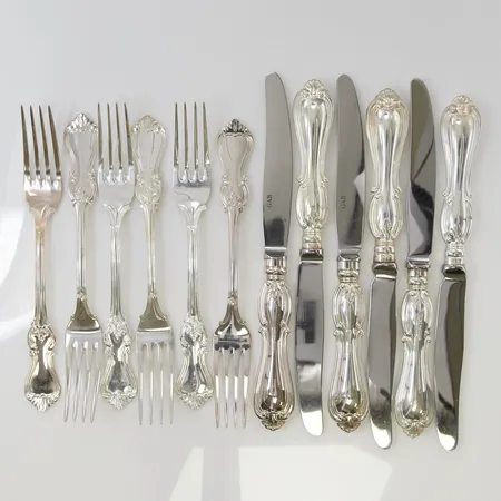 6 Gafflar 18cm, 6 Knivar 21cm, 830/1000 Silver bruttovikt 703,4g.