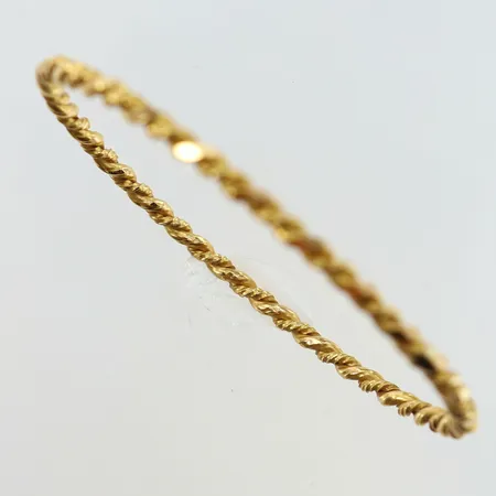 Armring tvinnad Ø62,5mm bredd 3mm ostämplat 21K. Vikt: 16,7 g