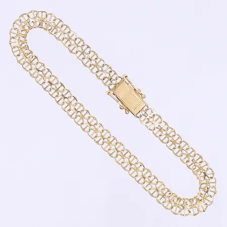 Armband X-länk med stav 19cm bredd 6mm tillv. Guldfynd, bruksslitage 18K Vikt: 6,9 g