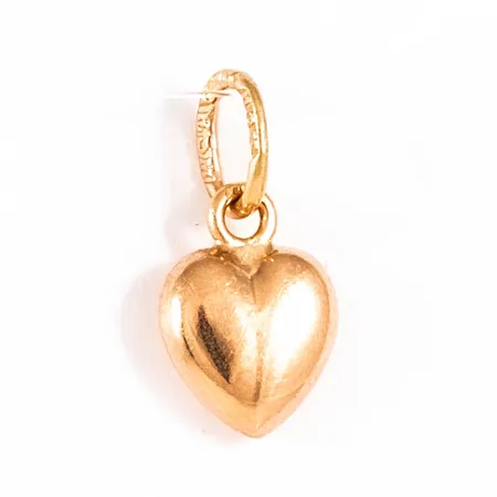 Hänge hjärta i 18K guld. Längd 12,4 mm inkl. ögla. Bredd 6,1 mm. Vikt 0,3g Vikt: 0,3 g