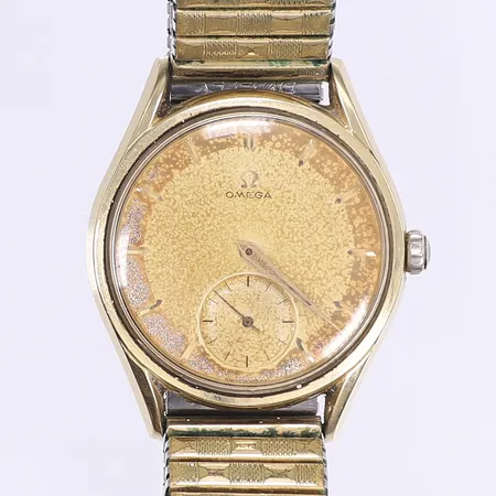 Herrur Omega Ø35mm, manuell, cal. 267, verknummer 15231461, boettnummer 289.1, guld på stål, skadad urtavla, skadad krona, mycket trög i uppdrag, ej funktionstestad troligt servicebehov, flexlänk i dubblé mycket sliten, inga tillbehör