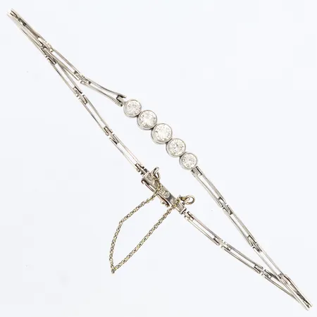 Armband vitguld med 5 diamanter, 0,10-0,16ct , längd: ca18,5cm bredd:2-4mm, säkerhetskedja, 18K Vikt: 10,5 g